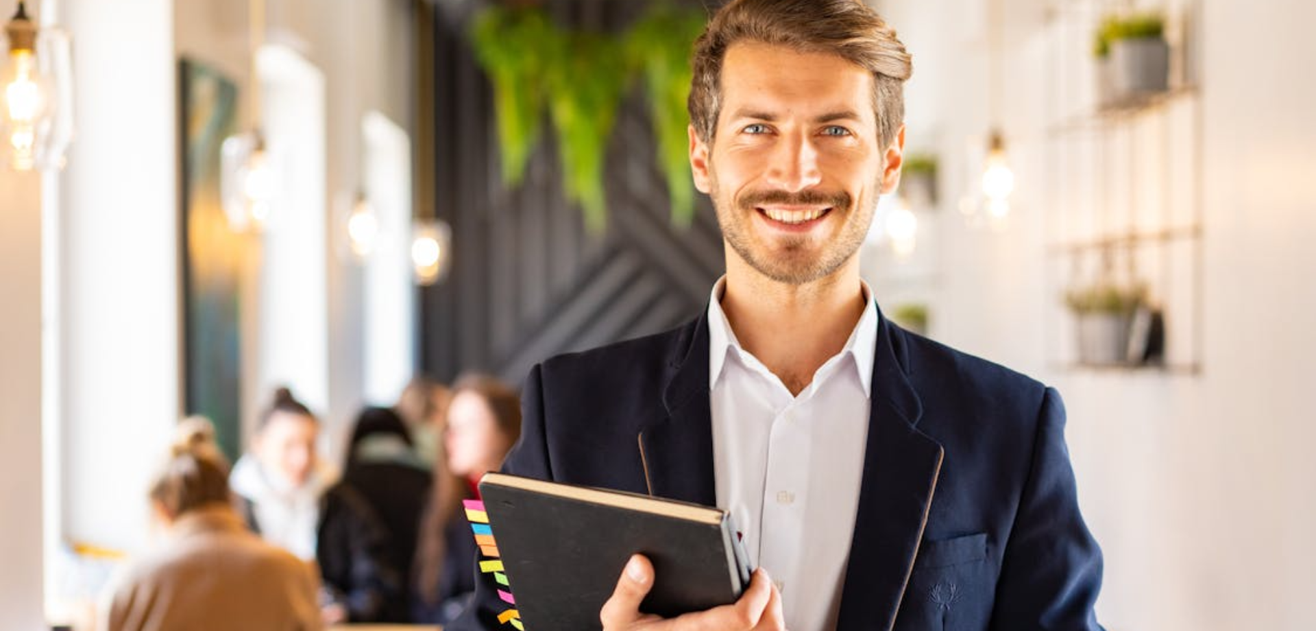 A Helvetios relocation specialist smiles into the camera